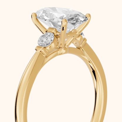 Micaela Three-Stone Oval Diamond Engagement Ring in Yellow Gold - slant-view.webp
