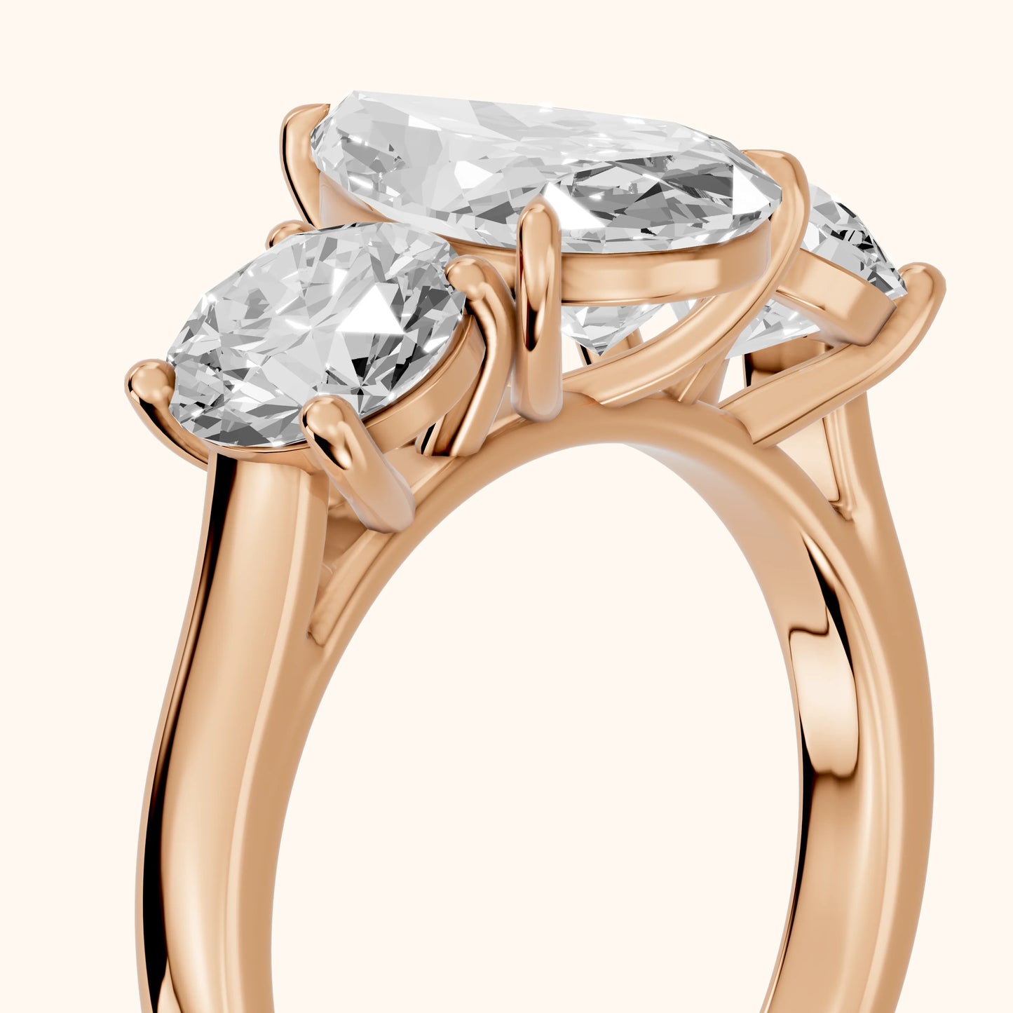 Esme Three-Stone Tapered Pear Diamond Ring in Rose Gold - slant-view.webp