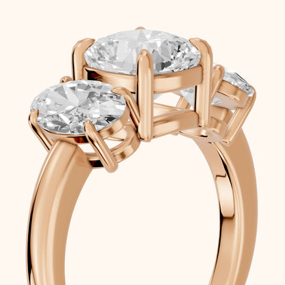 Lila Three-Stone Cushion Diamond Ring in Rose Gold - slant-view.webp