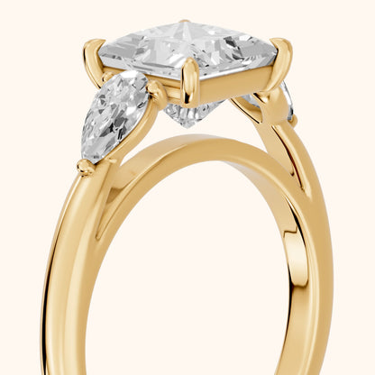 Phoebe Three-Stone Princess Diamond Ring in Yellow Gold - slant-view.webp