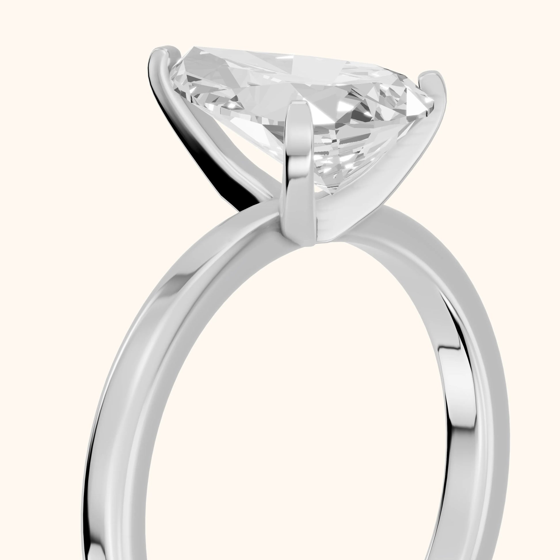 Liana Solitaire Claw Prong Pear Diamond Engagement Ring in Silver - slant-view.webp