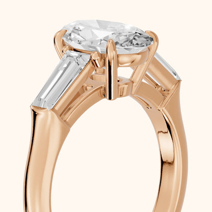 Davina Baguette Three-Stone Oval Diamond Engagement Ring in Rose Gold - slant-view.webp