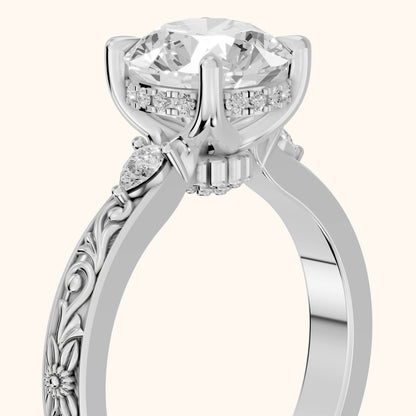 Siesta Three-Stone Engraved Round Diamond Engagement Ring in Platinum - slant-view.webp