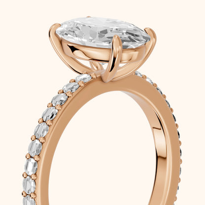 Aisha Pavé Solitaire Oval Diamond Engagement Ring in Rose Gold - slant-view.webp