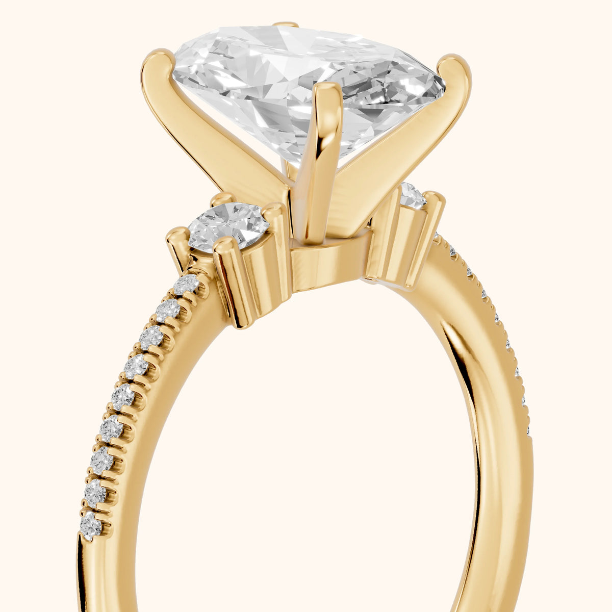 Nerissa Three-Stone Micropavé Oval Diamond Engagement Ring in Yellow Gold - slant-view.webp
