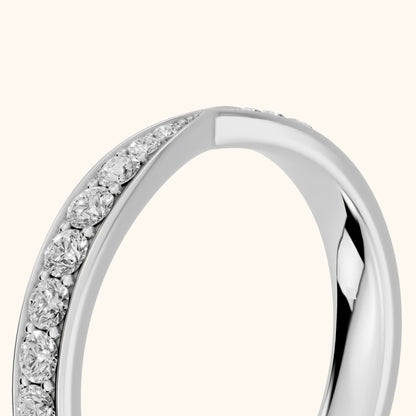 Clara Tapered Riviera Round Diamond Eternity Band in Platinum - slant-view