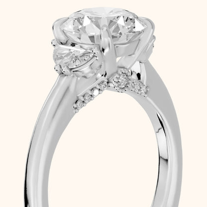 Geneva Half-Moon Three-Stone Round Diamond Engagement Ring in Platinum - slant-view.webp
