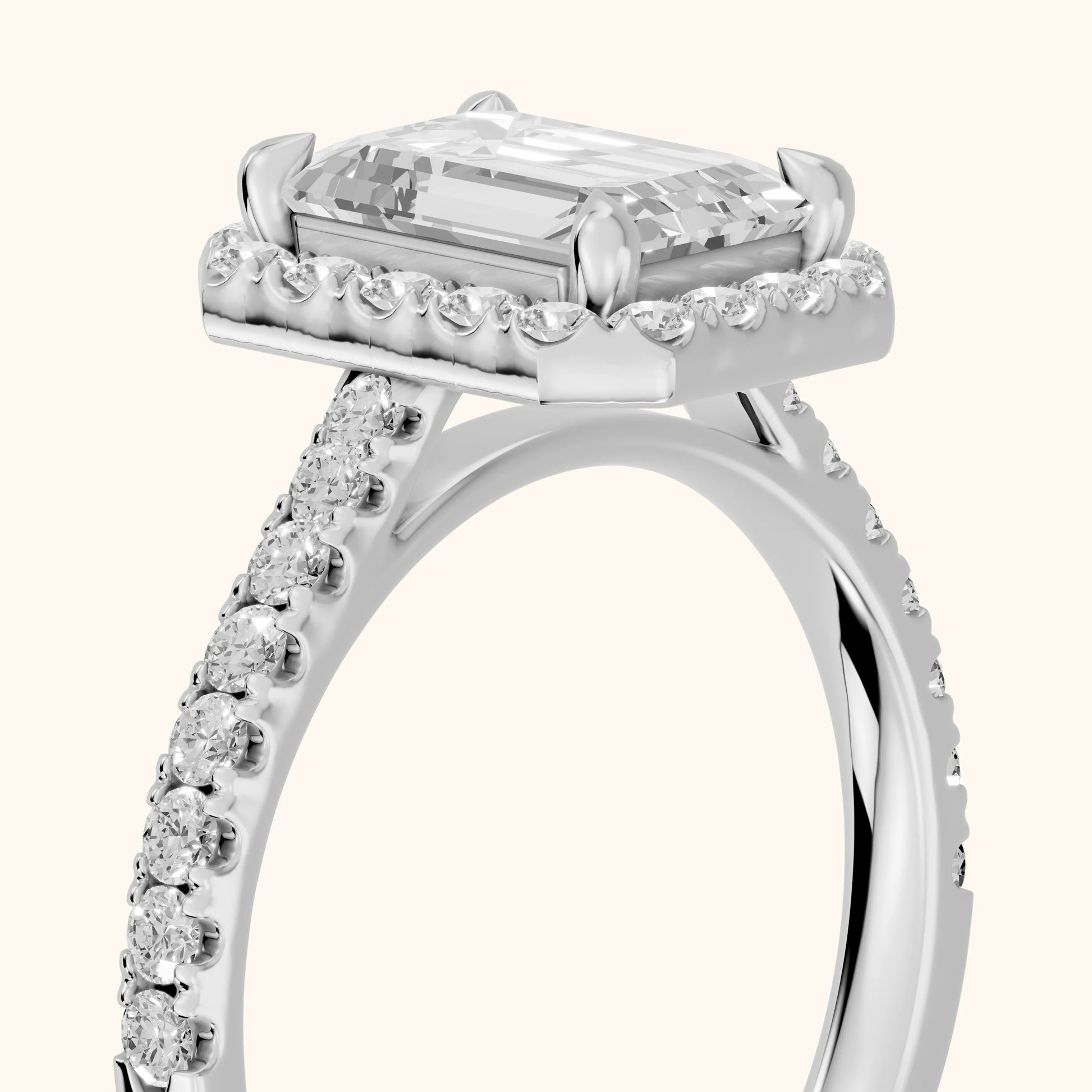 Amara Halo Claw Prong Emerald Diamond Ring in Silver - slant-view.webp