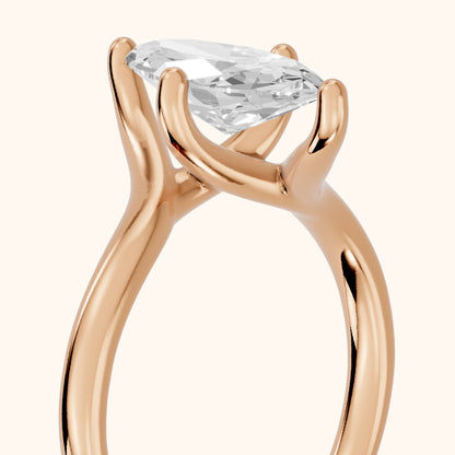 Clio Bypass Solitaire Marquise Diamond Engagement Ring in Rose Gold - slant-view.webp