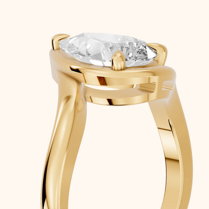 Tabitha Bypass Partial Bezel Pear Diamond Engagement Ring in Yellow Gold - slant-view.webp