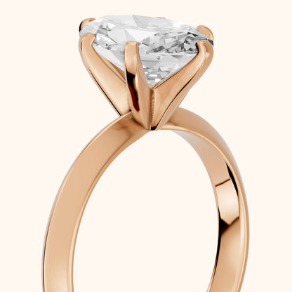 Hailey Solitaire Knife Edge Oval Diamond Engagement Ring in Rose Gold - slant-view.webp