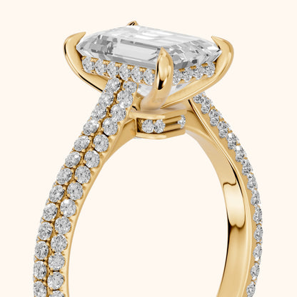 Della Hidden Halo Pavé Emerald Diamond Engagement Ring in Yellow Gold - slant-view.webp