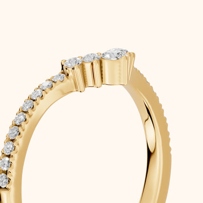 Colette Curved Riviera Round Diamond Wedding Band in Yellow Gold - slant-view