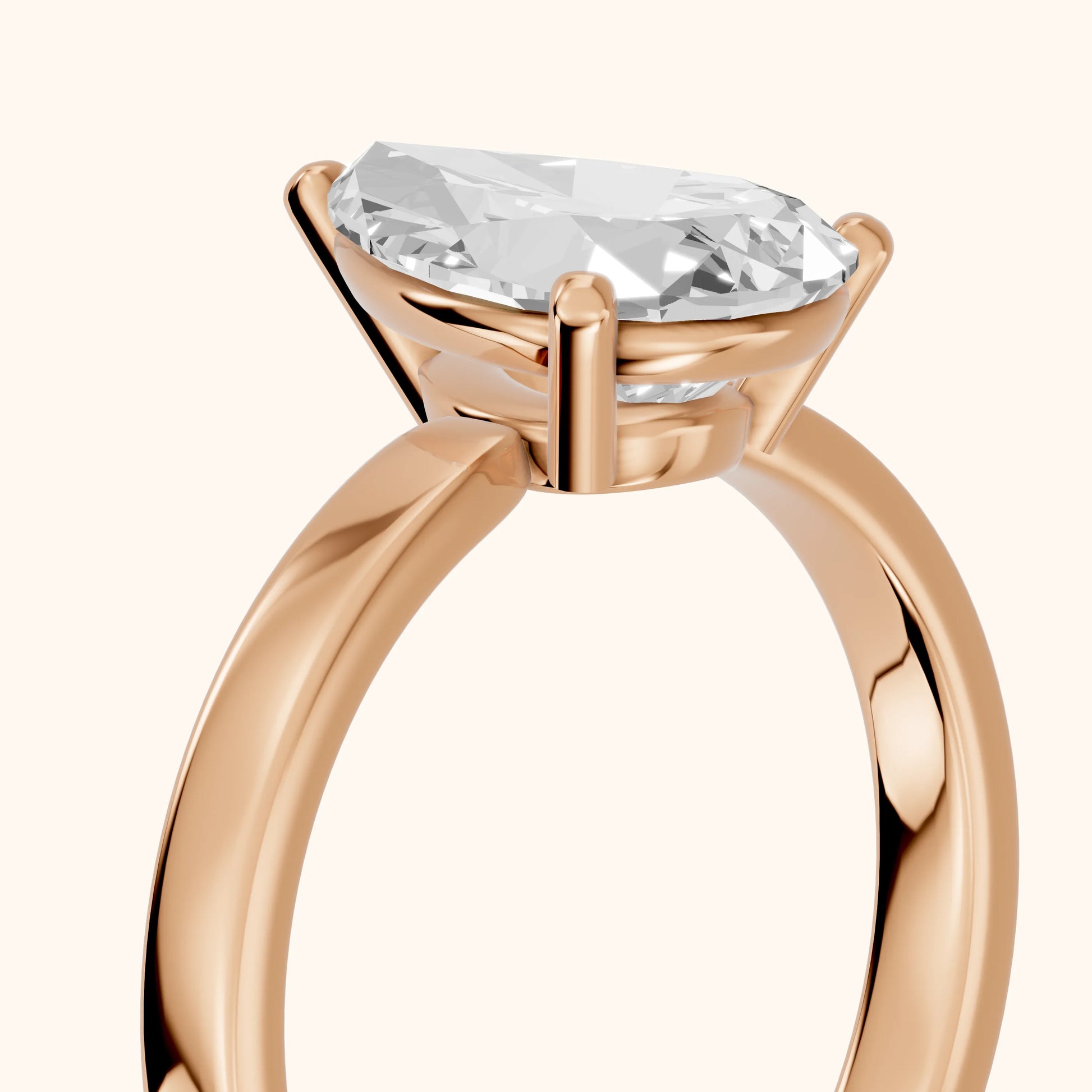 Delia Solitaire Pear Diamond Engagement Ring in Rose Gold - slant-view.webp