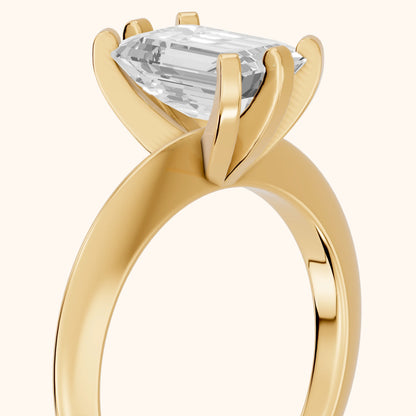 Arabella Six-Prong Solitaire Emerald Diamond Engagement Ring in Yellow Gold - slant-view.webp