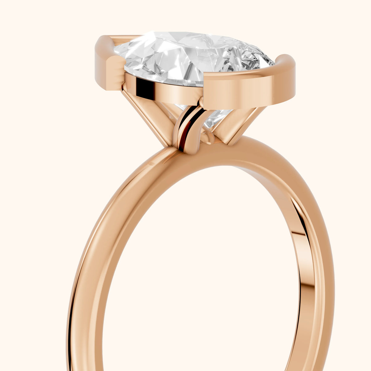 Bedford Half Bezel Solitaire Pear Diamond Engagement Ring in Rose Gold - slant-view.webp