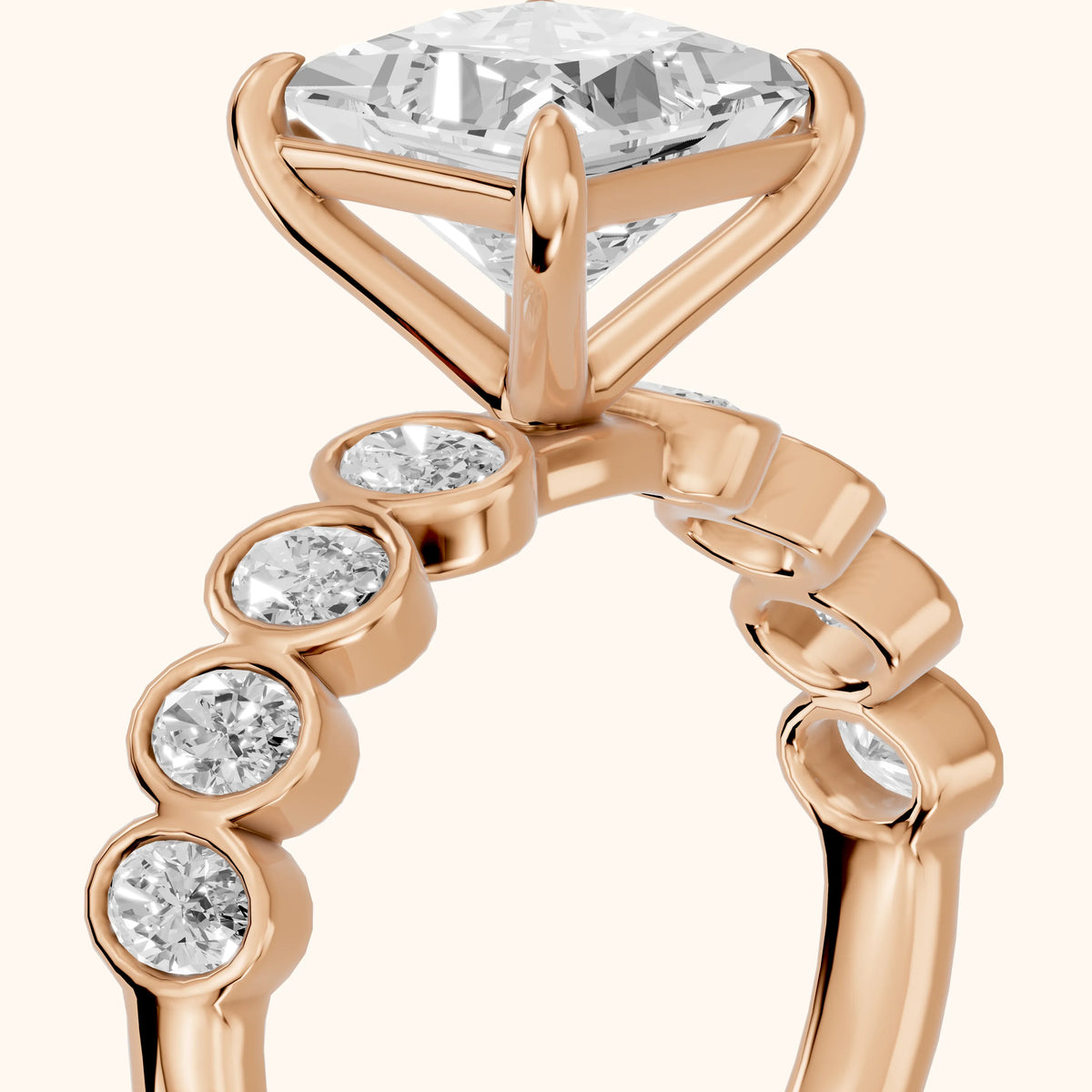 Vittoria Graduated Bezel Princess Diamond Engagement Ring in Rose Gold - slant-view.webp