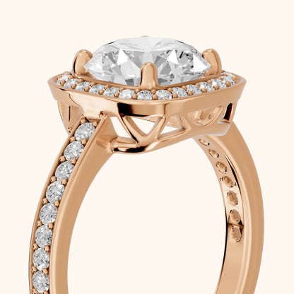 Nettie Halo Pavé Round Diamond Engagement Ring in Rose Gold - slant-view.webp