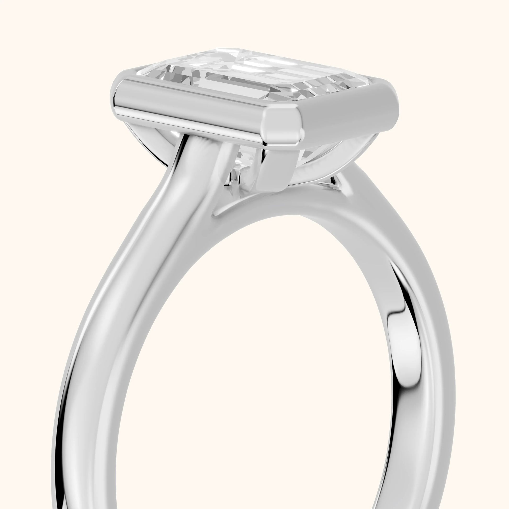 Jolie Bezel Solitaire Emerald Diamond Engagement Ring in Platinum - slant-view.webp