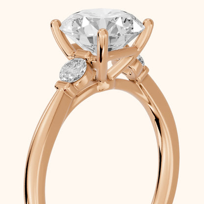 Micaela Three-Stone Round Diamond Engagement Ring in Rose Gold - slant-view.webp