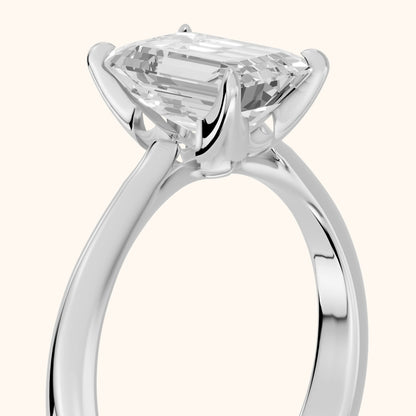 Evie Solitaire Six-Prong Emerald Diamond Engagement Ring in Platinum - slant-view.webp