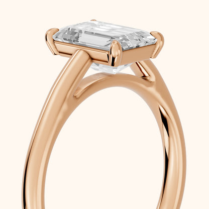 Sadie Cathedral Solitaire Emerald Diamond Ring in Rose Gold - slant-view.webp