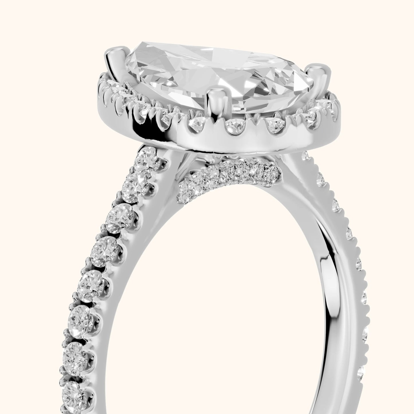 Sophie Halo Pavé Pear Diamond Ring in Platinum - slant-view.webp