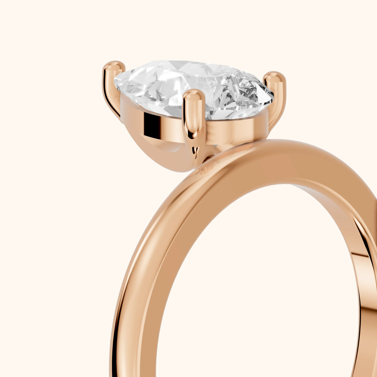 Maisie Four Prong Solitaire Pear Diamond Engagement Ring in Rose Gold - slant-view.webp