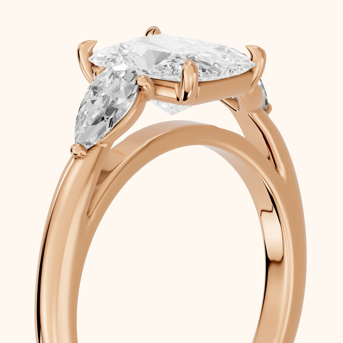 Stella Three-Stone Radiant Diamond Engagement Ring in Rose Gold - slant-view.webp