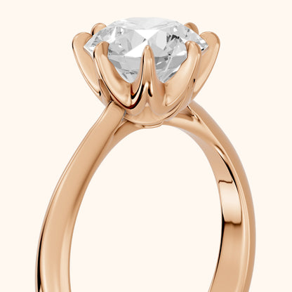 Evie Solitaire Six-Prong Round Diamond Engagement Ring in Rose Gold - slant-view.webp