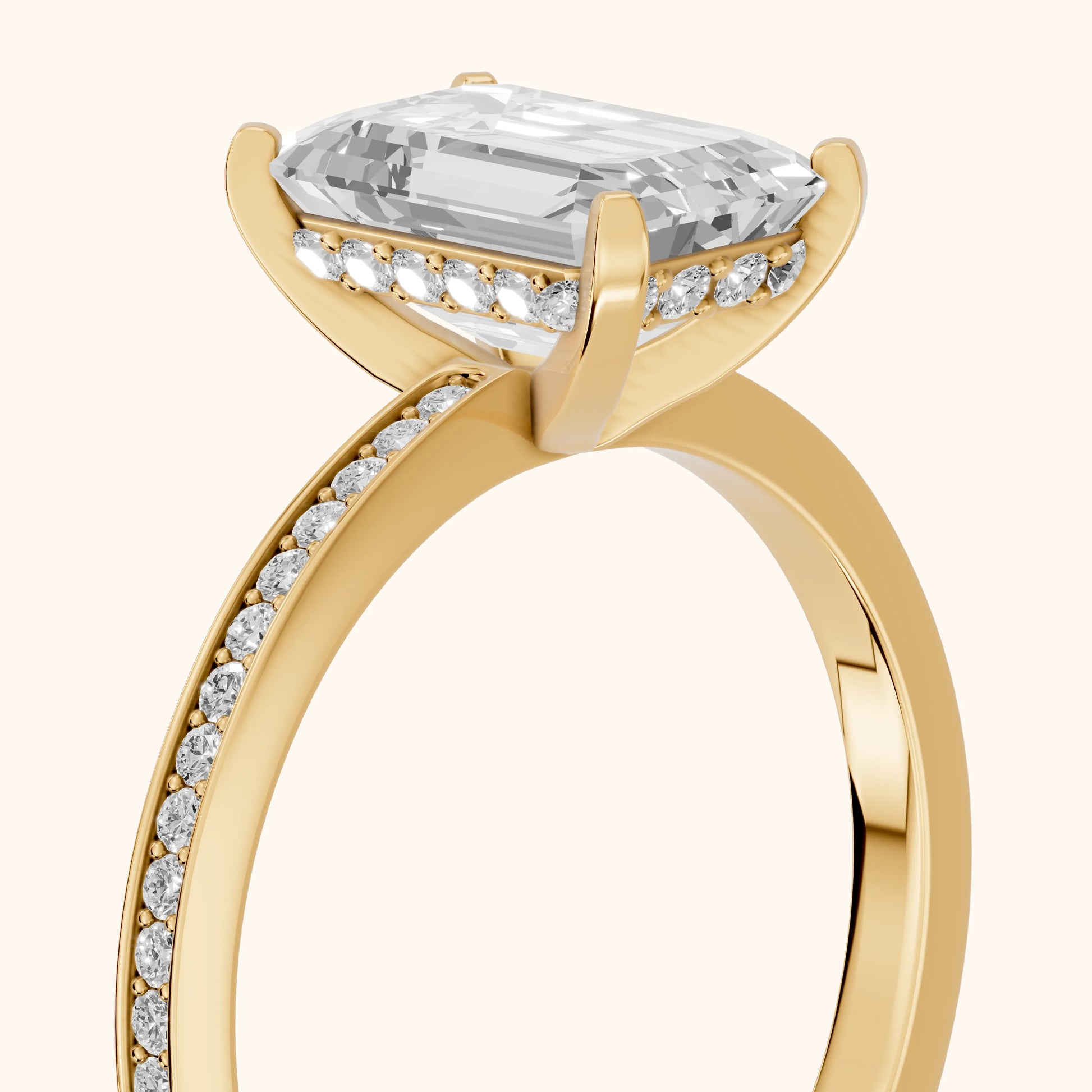 Naia Hidden Halo Emerald Diamond Ring in Yellow Gold - slant-view.webp