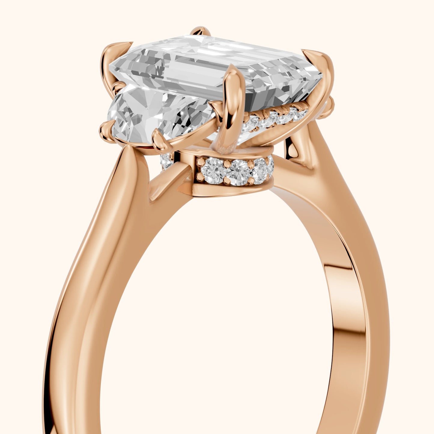 Romy Three-Stone Emerald Diamond Engagement Ring in Rose Gold - slant-view.webp