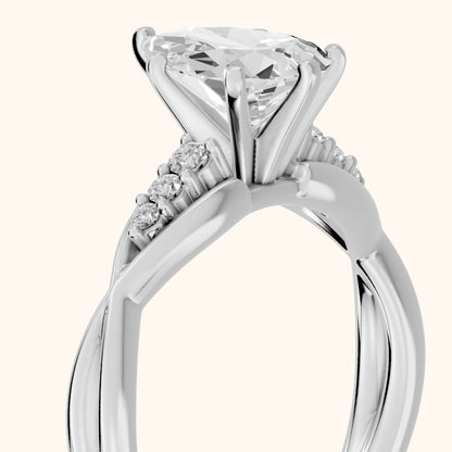 Stefania Twist Pear Diamond Engagement Ring in Platinum - slant-view.webp