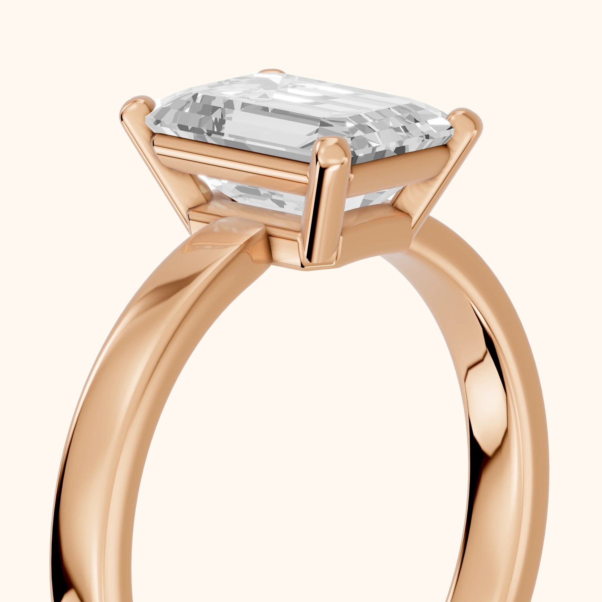 Delia Solitaire Emerald Diamond Engagement Ring in Rose Gold - slant-view.webp