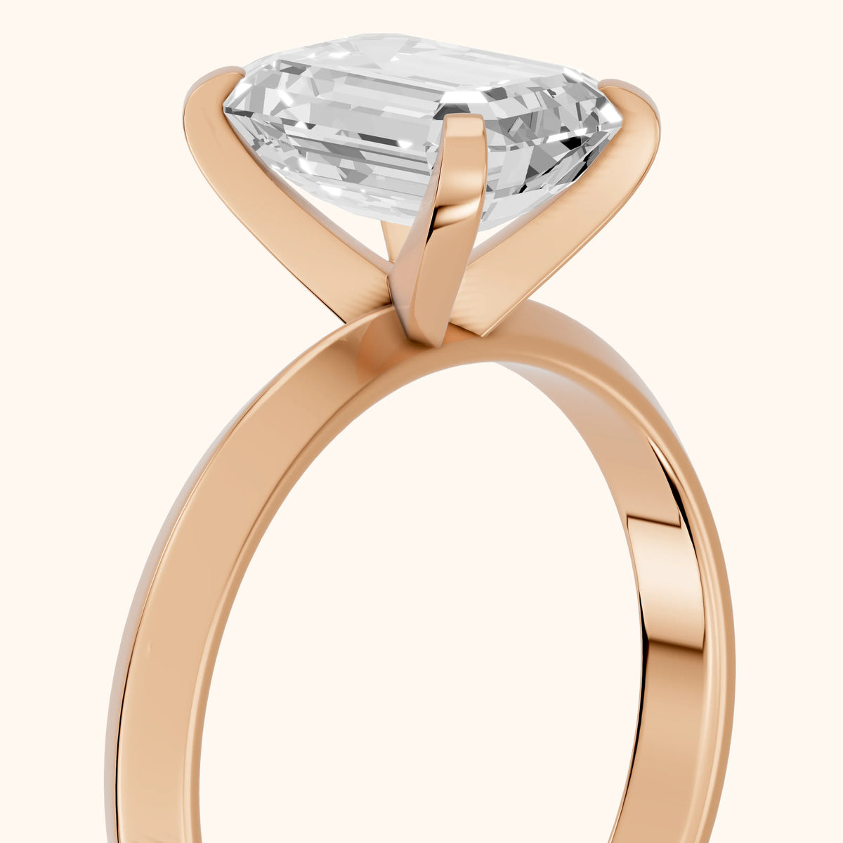 June Solitaire Knife Edge Emerald Diamond Engagement Ring in Rose Gold - slant-view.webp