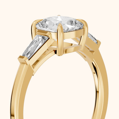 Winnie Three-Stone Cushion Diamond Engagement Ring in Yellow Gold - slant-view.webp