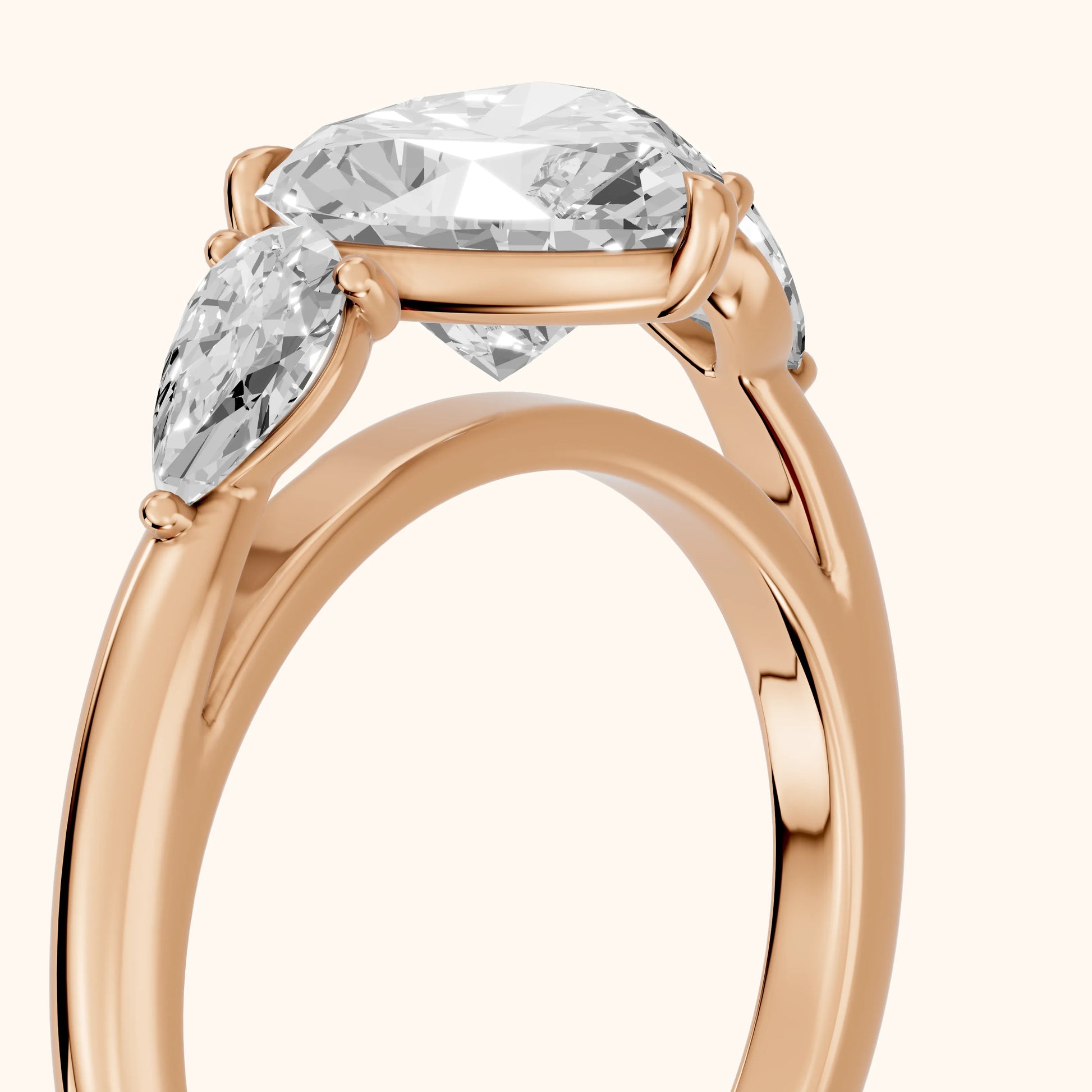 Phoebe Three-Stone Heart Diamond Ring in Rose Gold - slant-view.webp