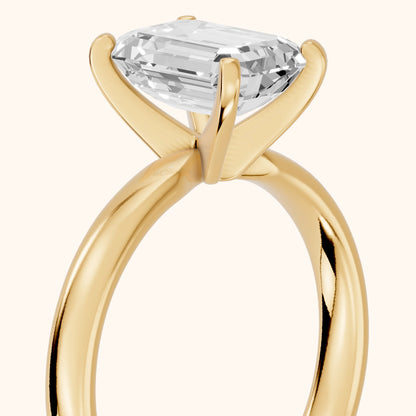 Elspeth Solitaire Emerald Diamond Engagement Ring in Yellow Gold - slant-view.webp
