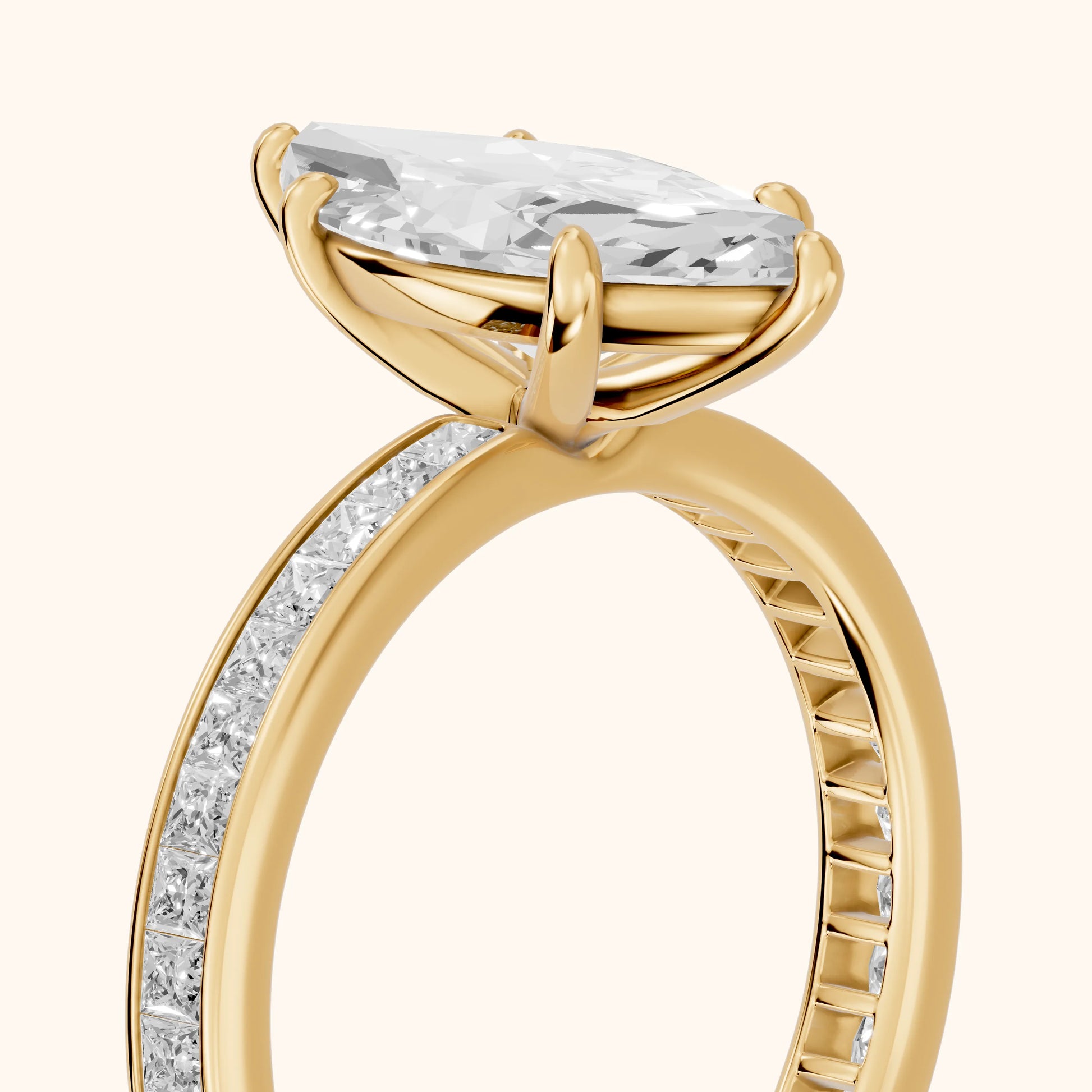 Brielle Channel Set Solitaire Marquise Diamond Ring in Yellow Gold - slant-view.webp