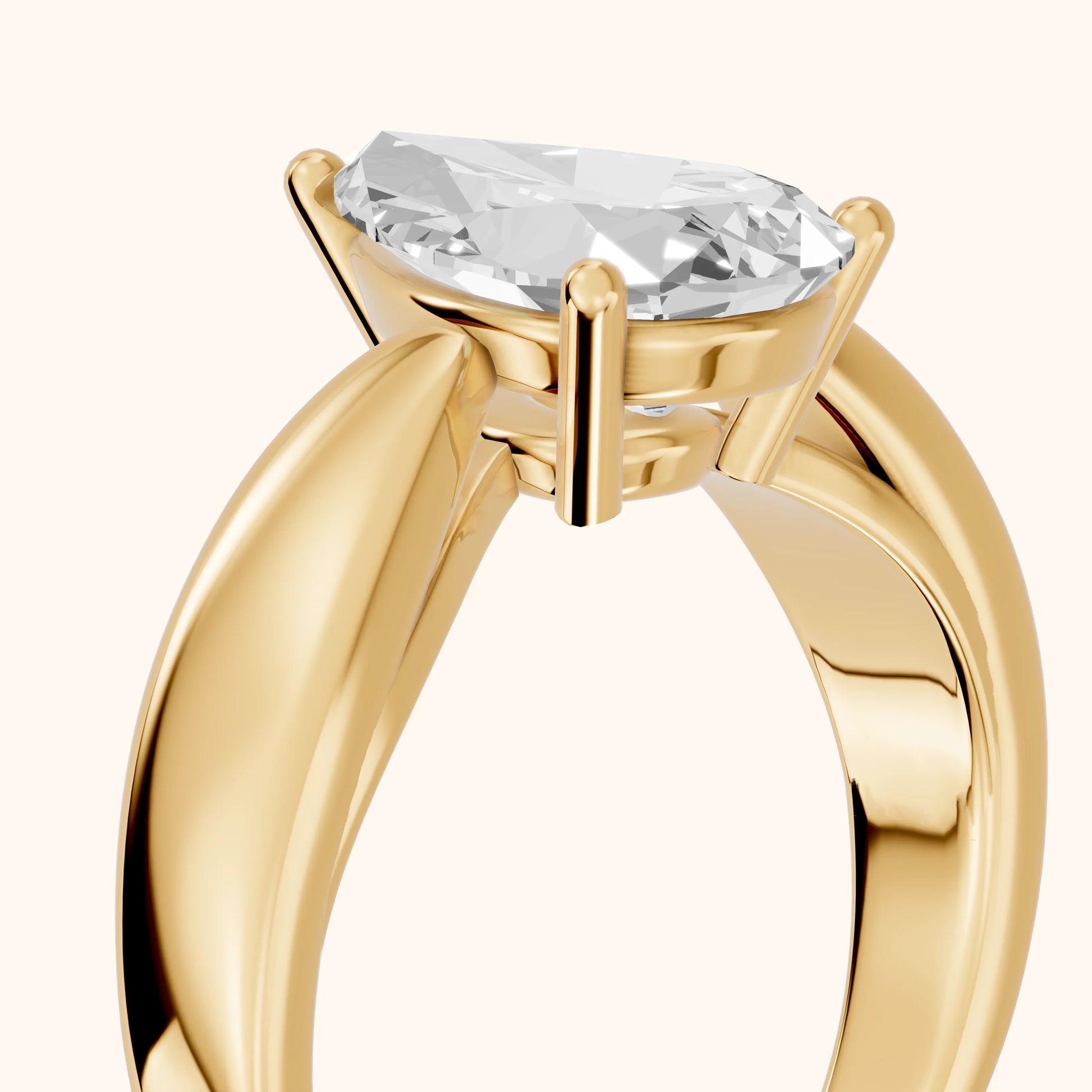 Talia Solitaire Twist Pear Diamond Engagement Ring in Yellow Gold - slant-view.webp