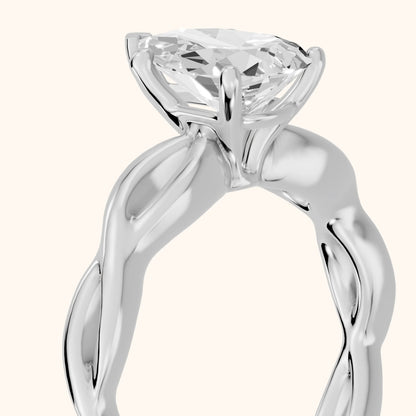 Wisteria Twist Solitaire Pear Diamond Engagement Ring in Silver - slant-view.webp