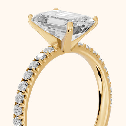 Juna French Pavé Solitaire Emerald Diamond Engagement Ring in Yellow Gold - slant-view.webp