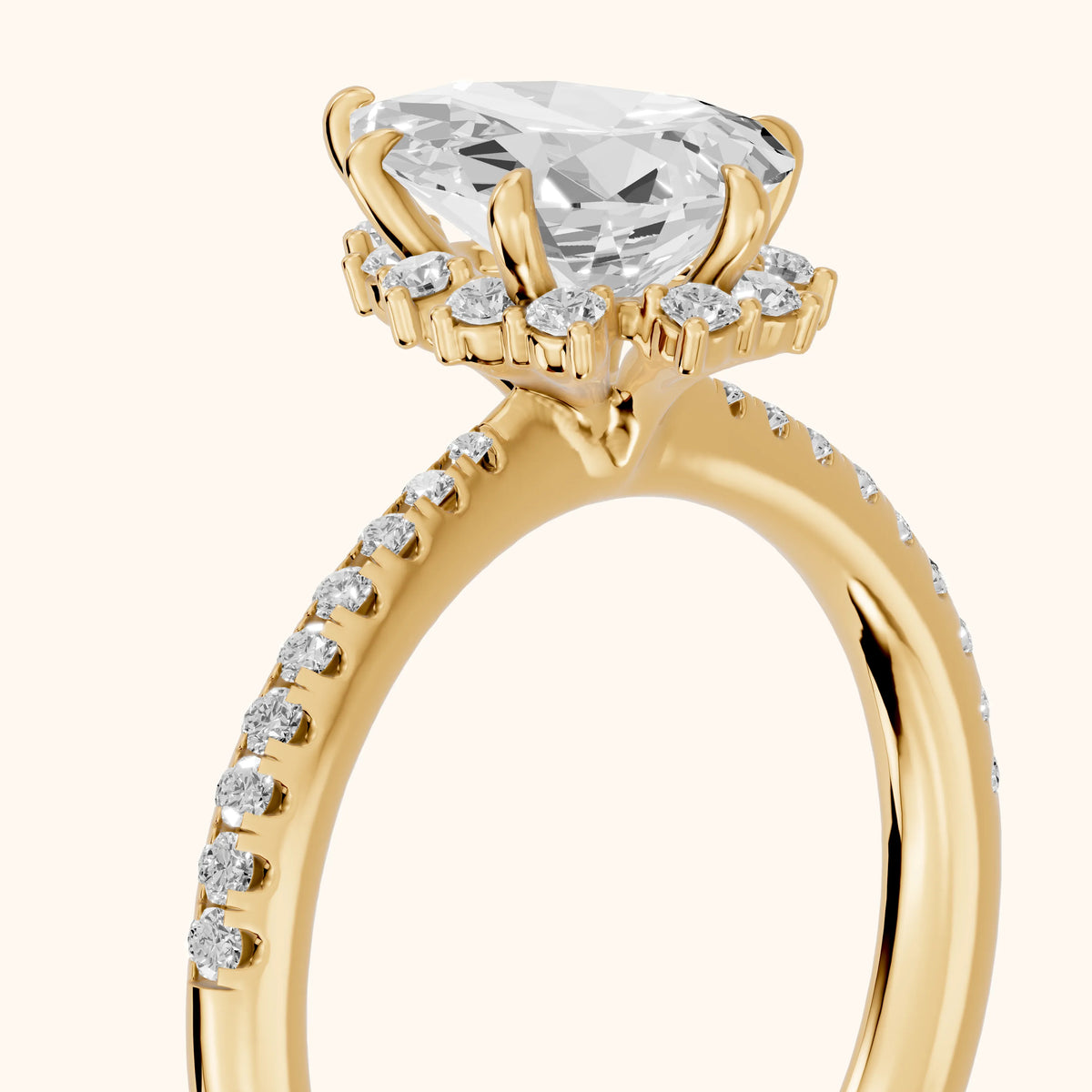 Leonie Starburst Halo Pear Diamond Engagement Ring in Yellow Gold - slant-view.webp