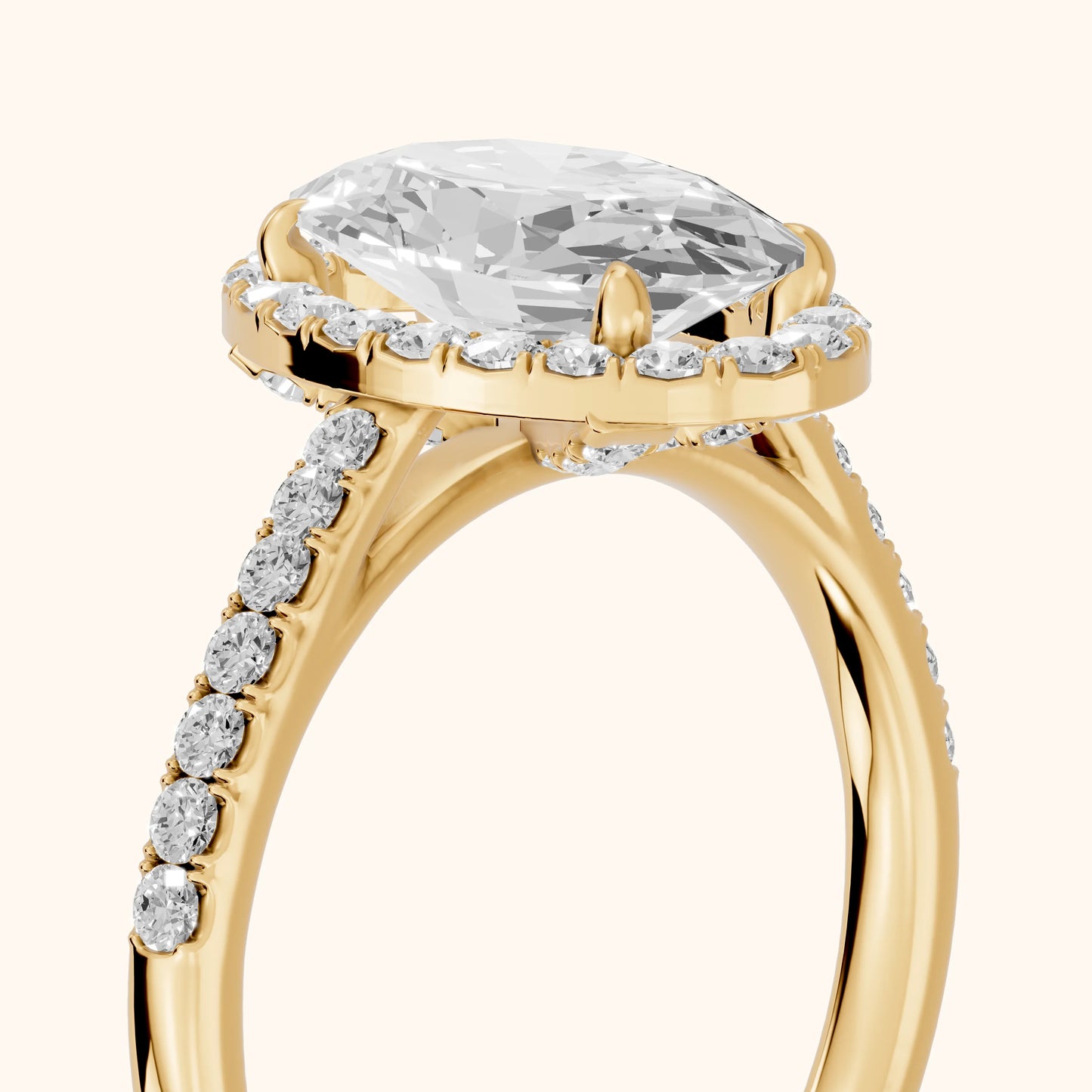 Alma Halo Pavé Oval Diamond Ring in Yellow Gold - slant-view.webp