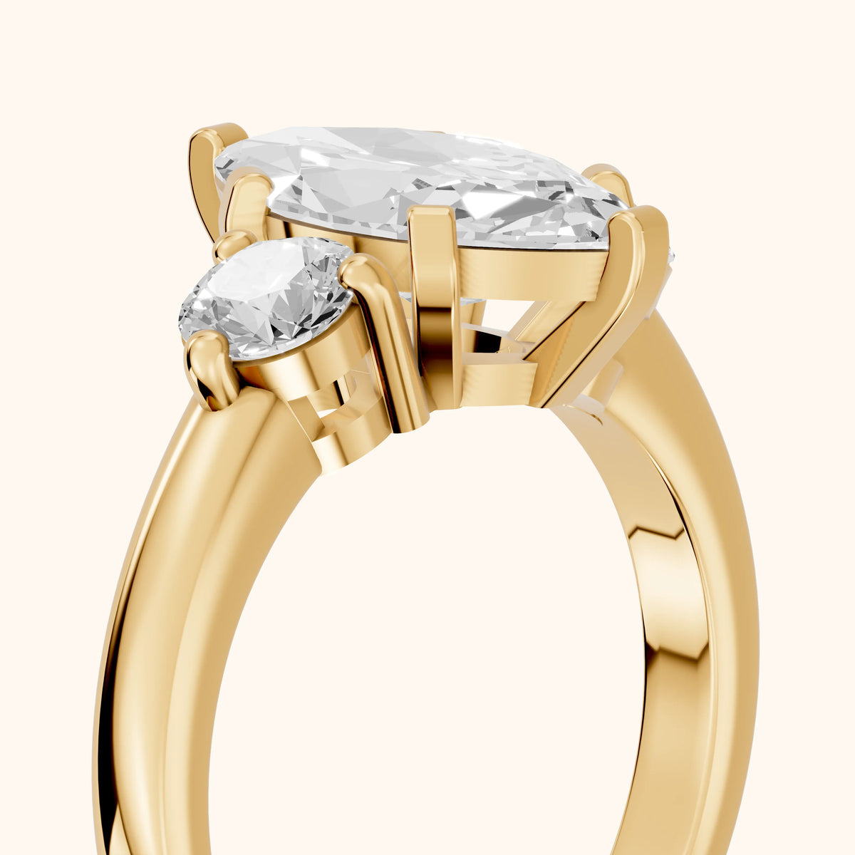 Freesia Three-Stone Marquise Diamond Engagement Ring in Yellow Gold - slant-view.webp