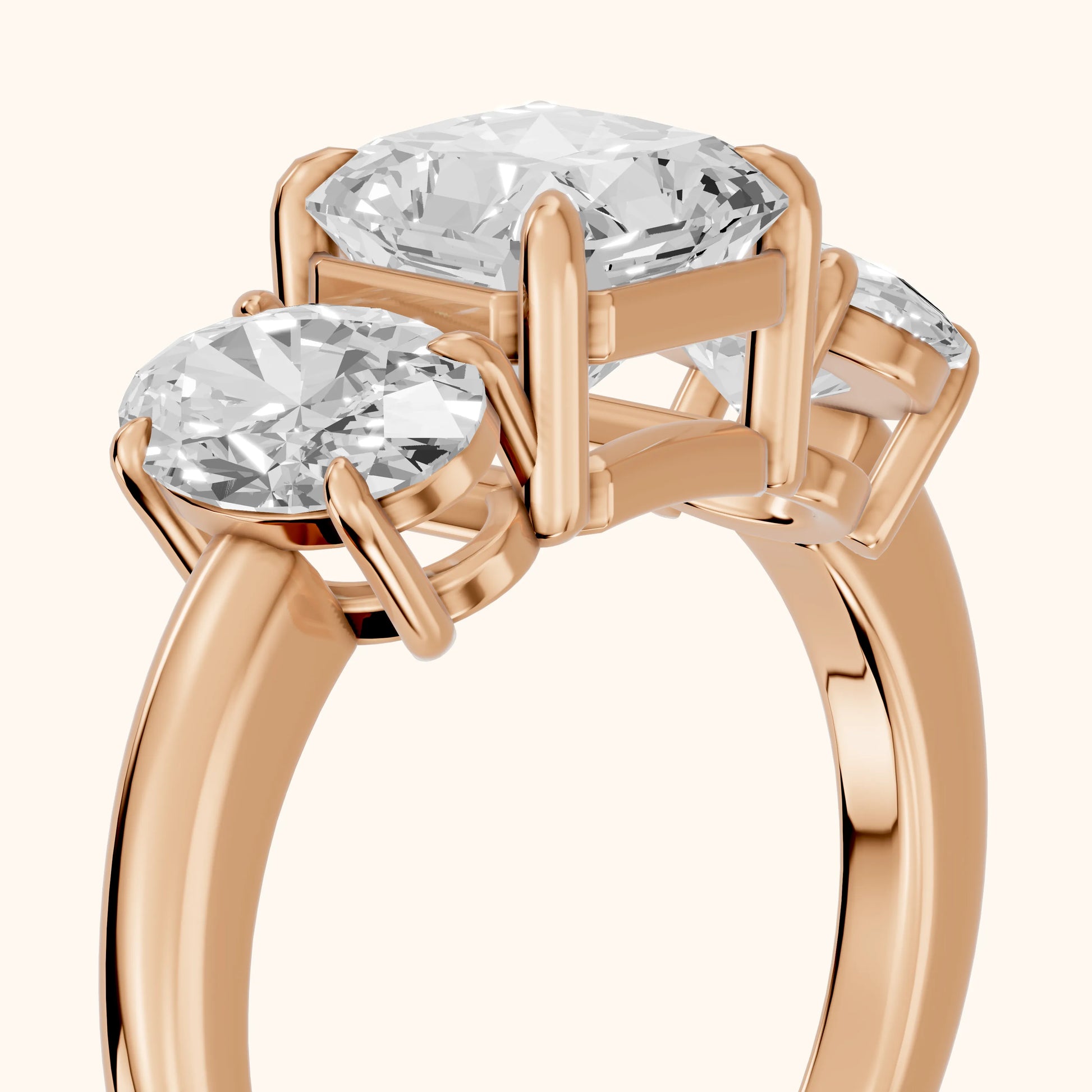 Lila Three-Stone Radiant Diamond Ring in Rose Gold - slant-view.webp