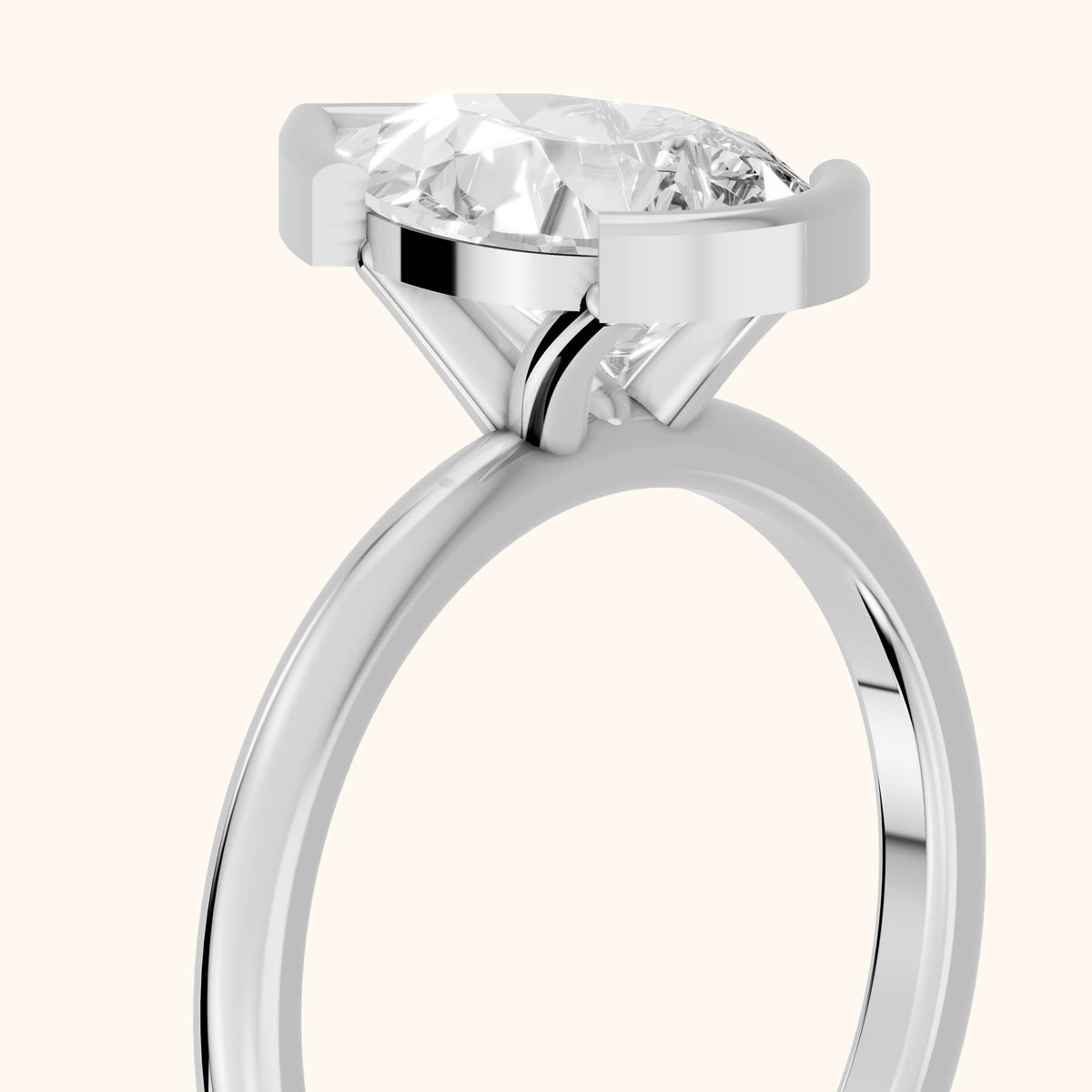 Bedford Half Bezel Solitaire Pear Diamond Engagement Ring in Silver - slant-view.webp