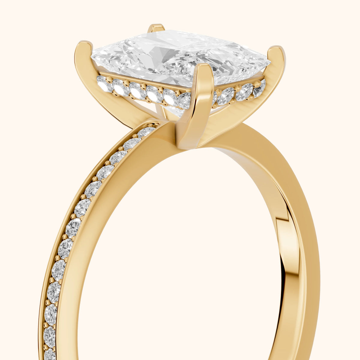 Naia Hidden Halo Radiant Diamond Engagement Ring in Yellow Gold - slant-view.webp