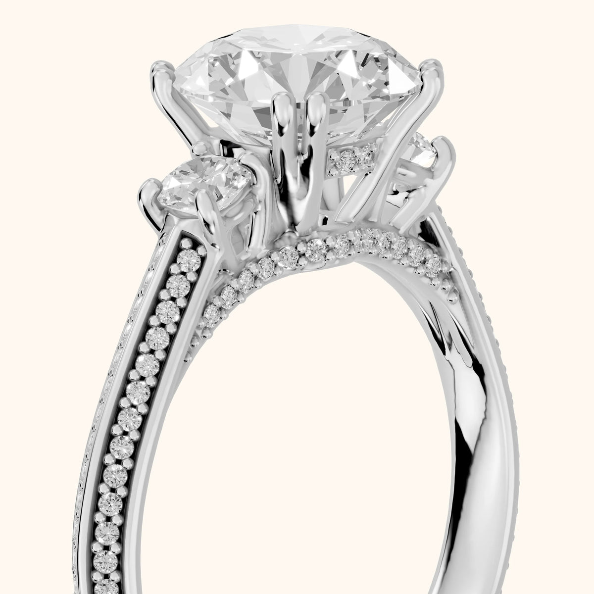 Aspen Three-Stone Knife Edge Round Diamond Engagement Ring in Platinum - slant-view.webp