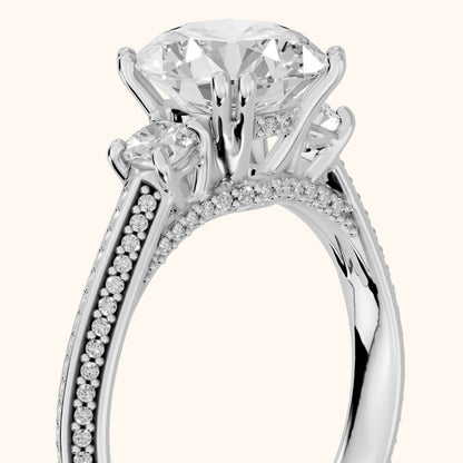 Aspen Three-Stone Knife Edge Round Diamond Engagement Ring in Platinum - slant-view.webp